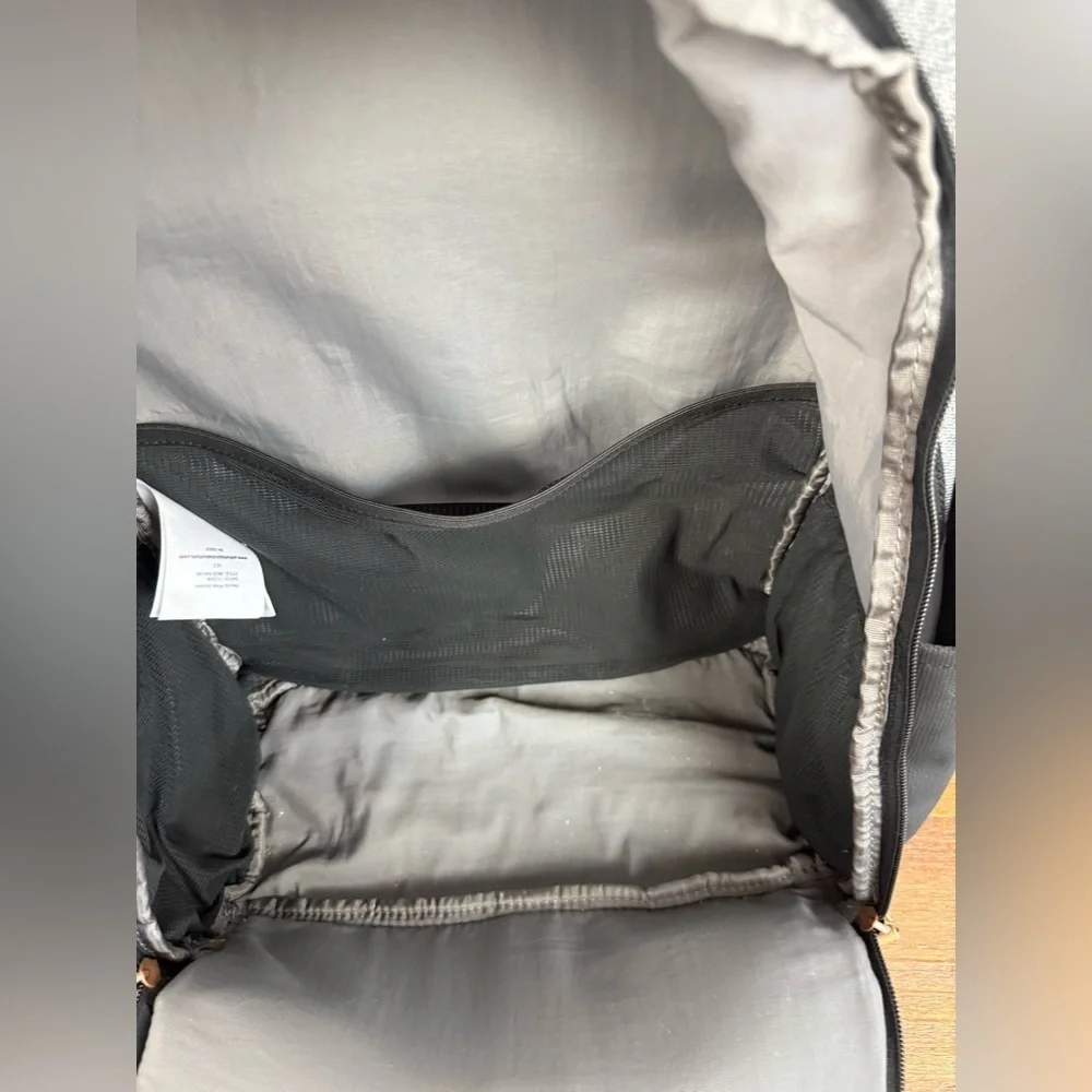 Petunia Pickle Bottom gray & black backpack shoulder diaper bag.